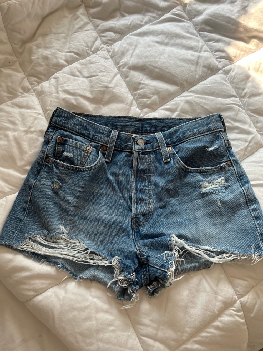 Levi's Distressed Light Blue Denim Cutoff Shorts
